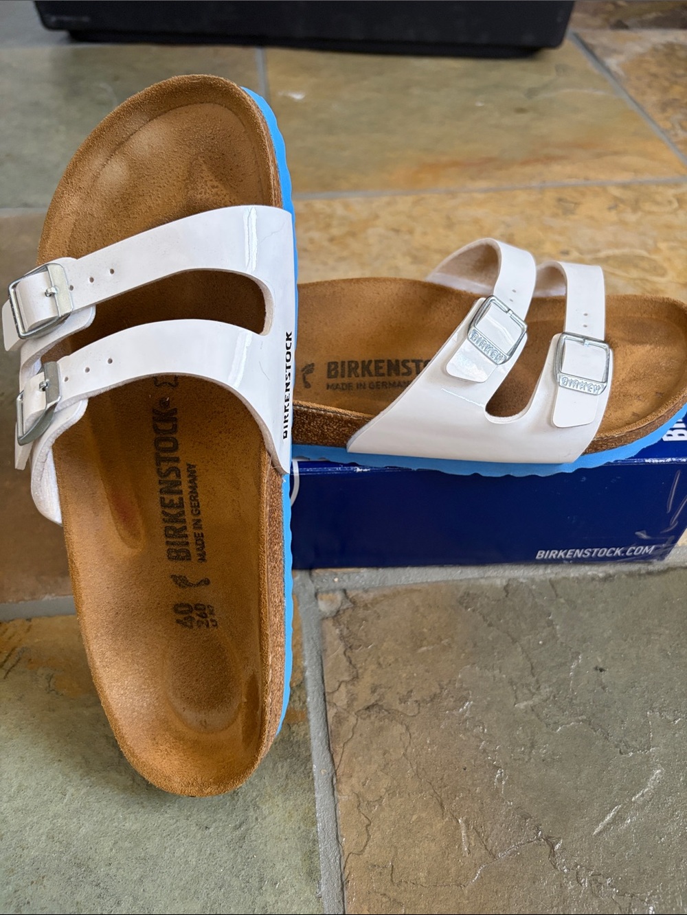 Birkenstock White Two-Strap Sandals with Blue Sole
